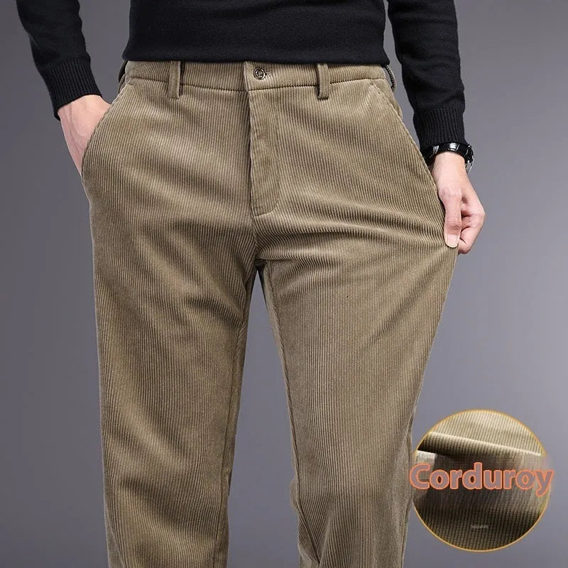 British retro striped straight-leg men's trousers in khaki colour on a hanger.