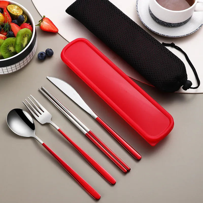 Four-piece stainless steel cutlery set with knife, fork, spoon and teaspoon in a mesh bag, gold and silver colour options