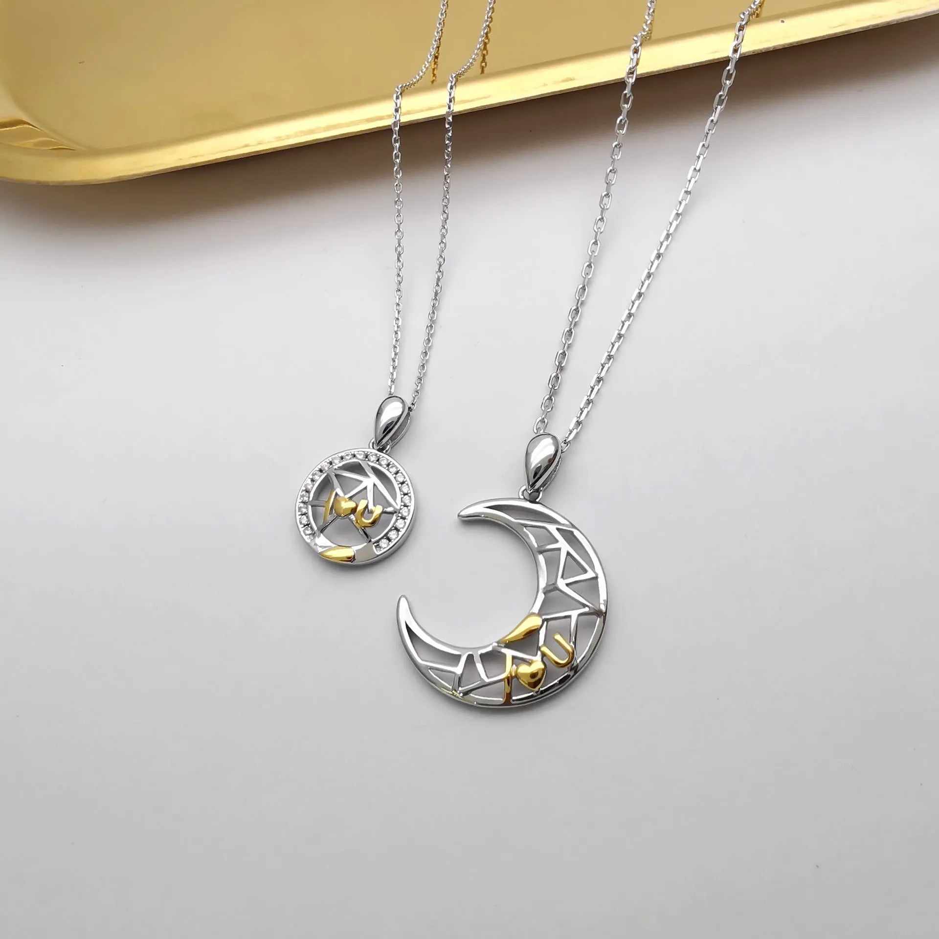 Sun and moon tooth couple necklace with copper pendants on cross chain