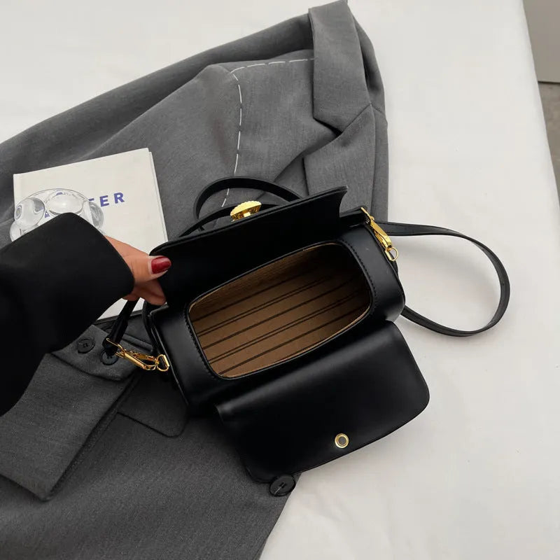 Women's personalised PU leather shoulder messenger bag in black, beige, pink, or khaki with lettering detail.