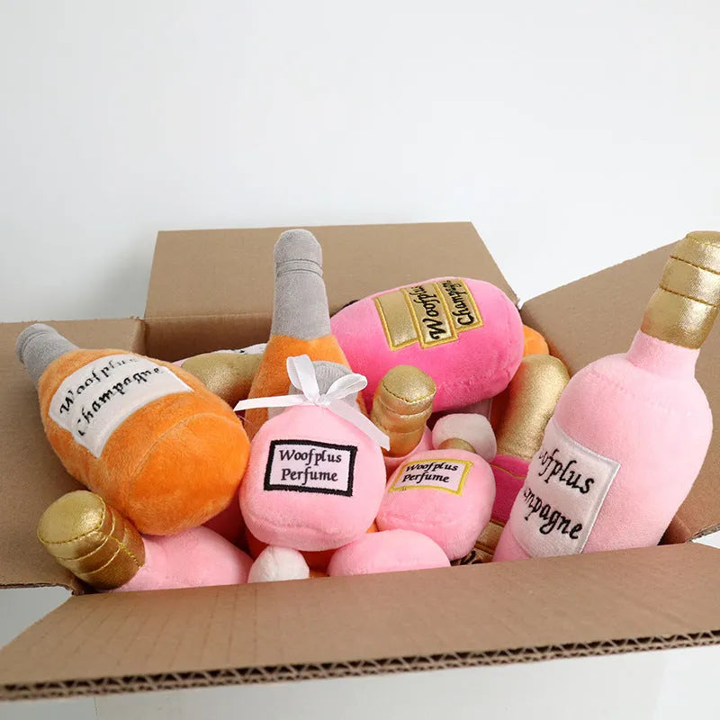 Plush wine bottle shaped dog toy with squeaker in various colour options