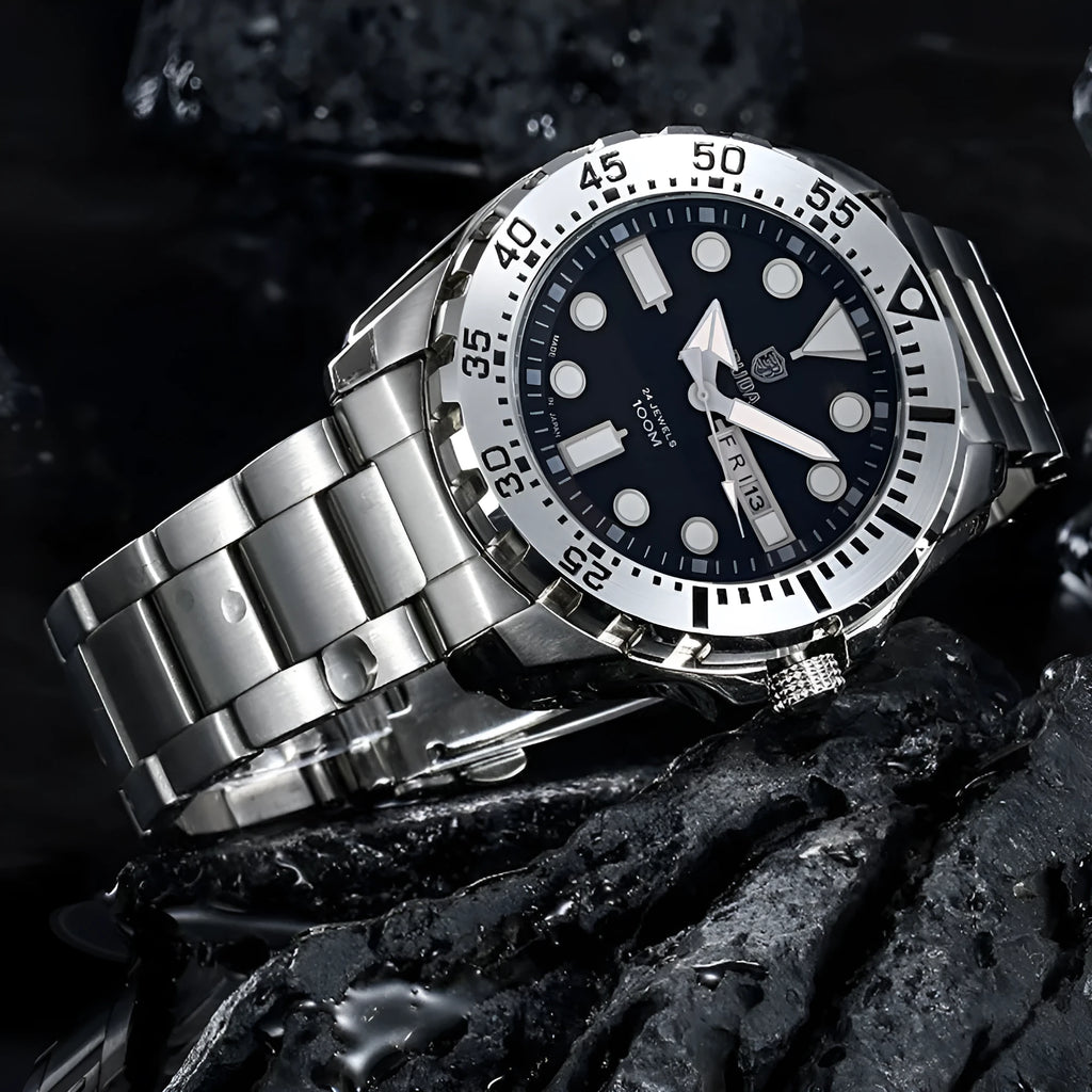 Waterproof men's sports watch with luminous dial, shown in silver case with blue dial and steel strap