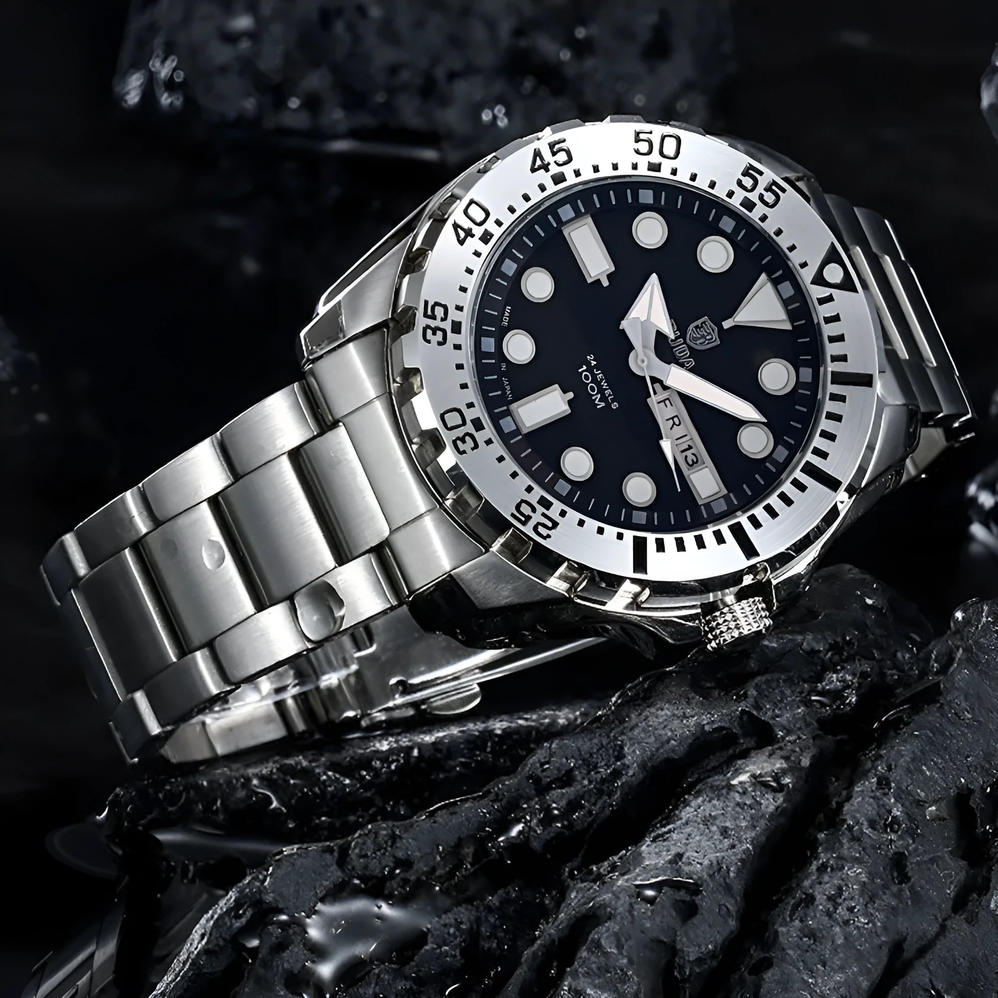 Waterproof men's sports watch with luminous dial, shown in silver case with blue dial and steel strap