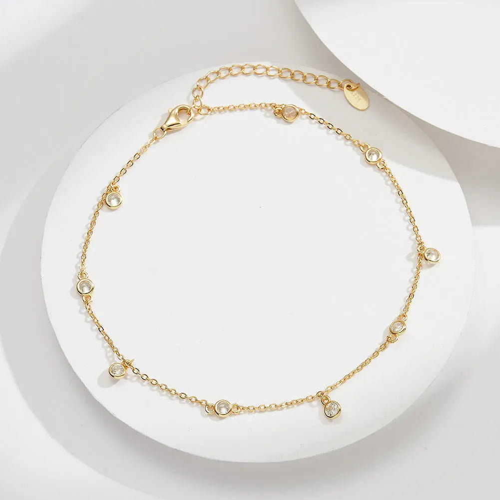 Women's geometric anklet with zirconium pendant in gold and platinum colour options