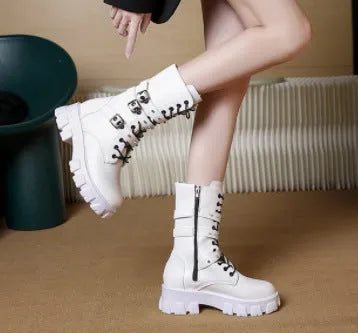 Black women's mid-calf knight boots with metal buckle and side zipper on a round toe.