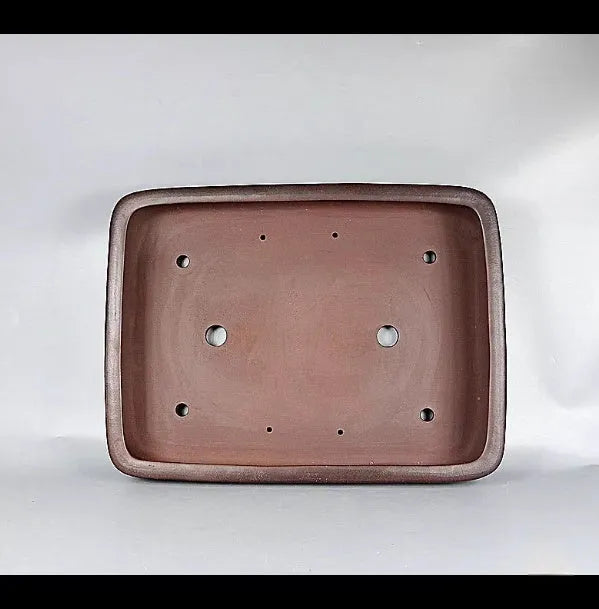 Handmade rectangular antique purple clay flower pot showing its size and textured finish.