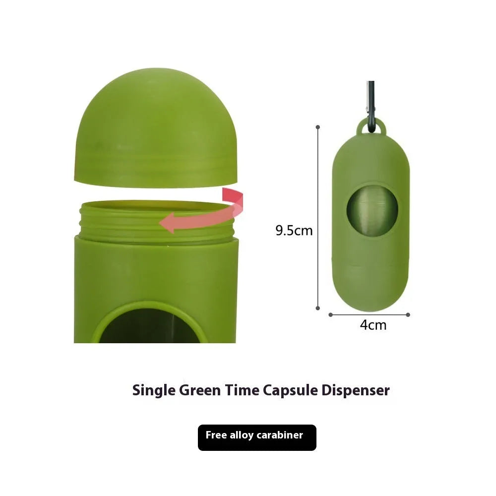 Roll of green EPI degradable dog poop bags next to a white dispenser on a table.