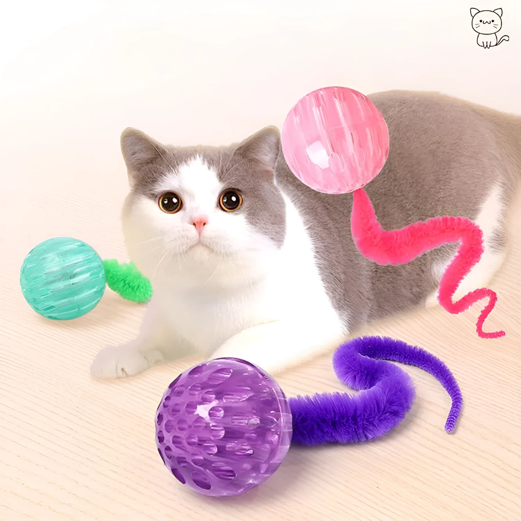 Interactive worm-shaped bouncy ball cat toy with tail in green, pink, or purple colours