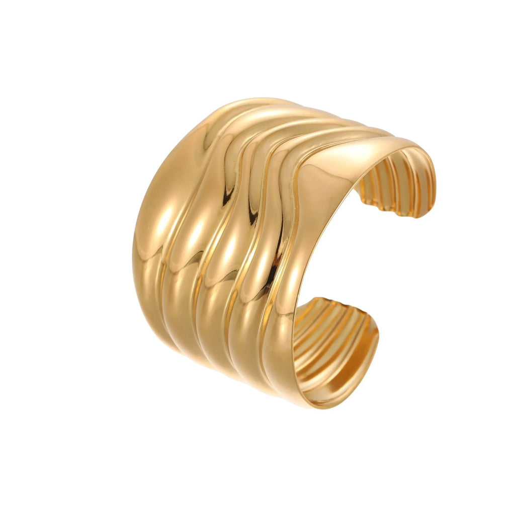 Women's stainless steel bracelet with 18K gold plating featuring wave geometric design