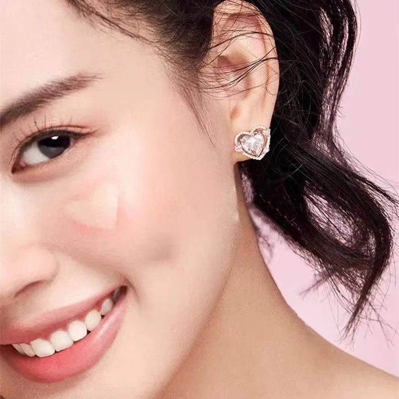 Guardian Heart white k electroplated copper stud earrings showing heart shape design