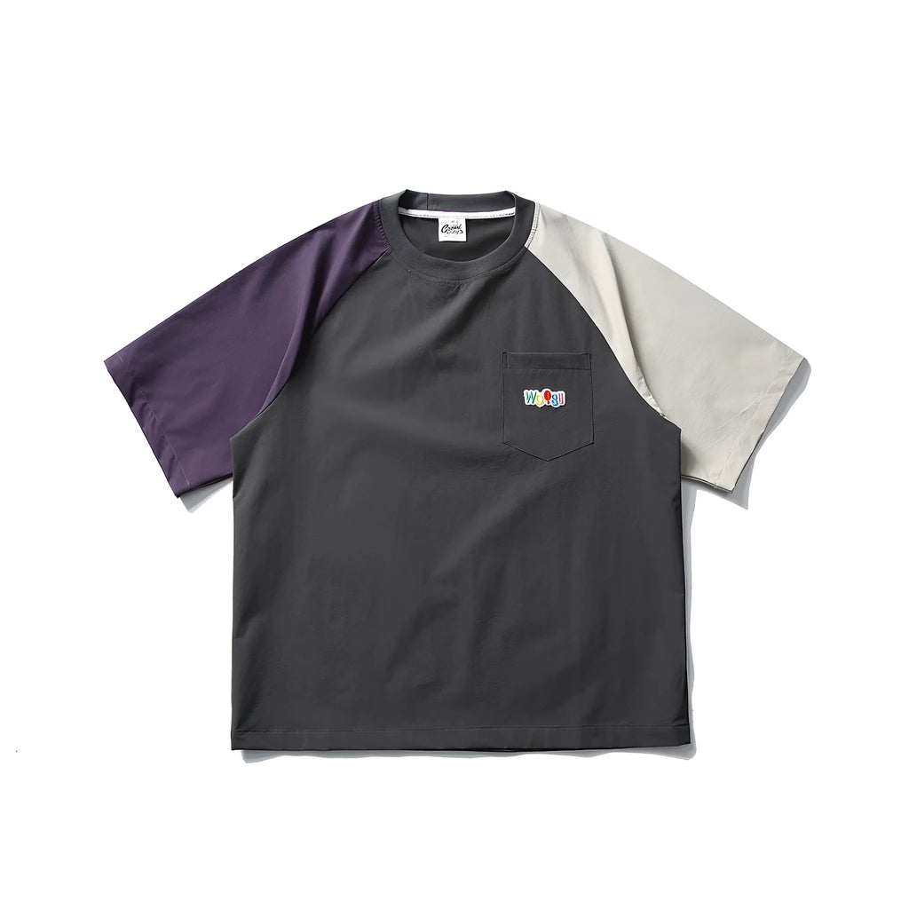 Dark grey men's loose fit t-shirt with light coloured contrast raglan sleeves.