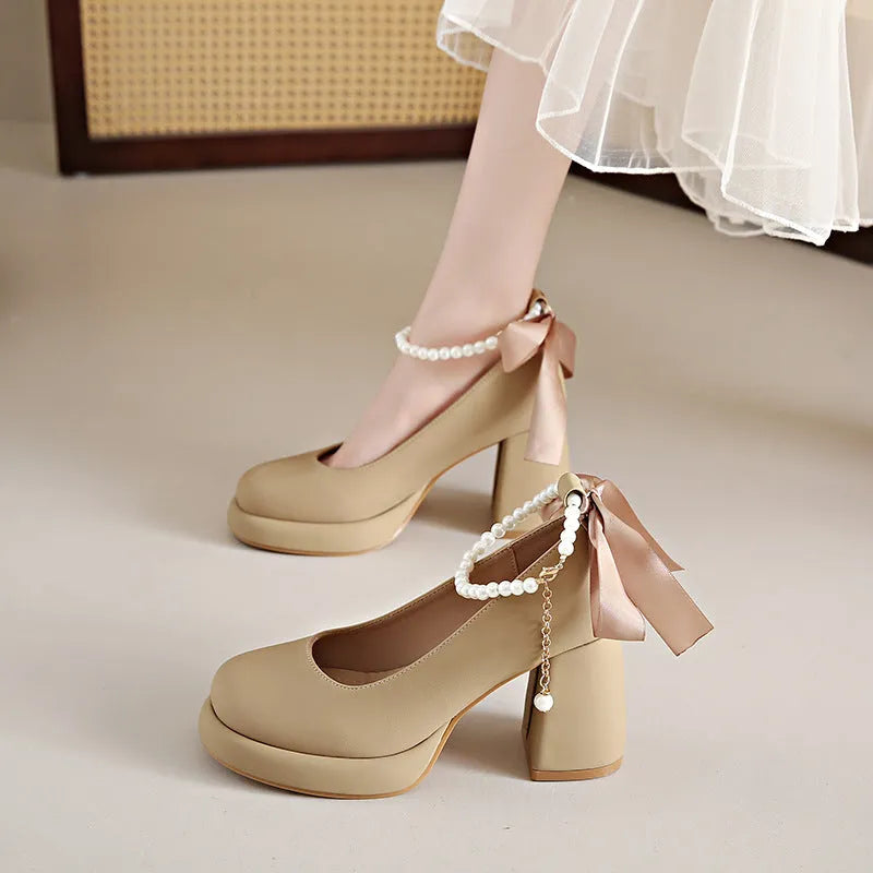 Women's beige Mary Jane shoes with chunky heel, pearl decoration, and ankle-strap buckle