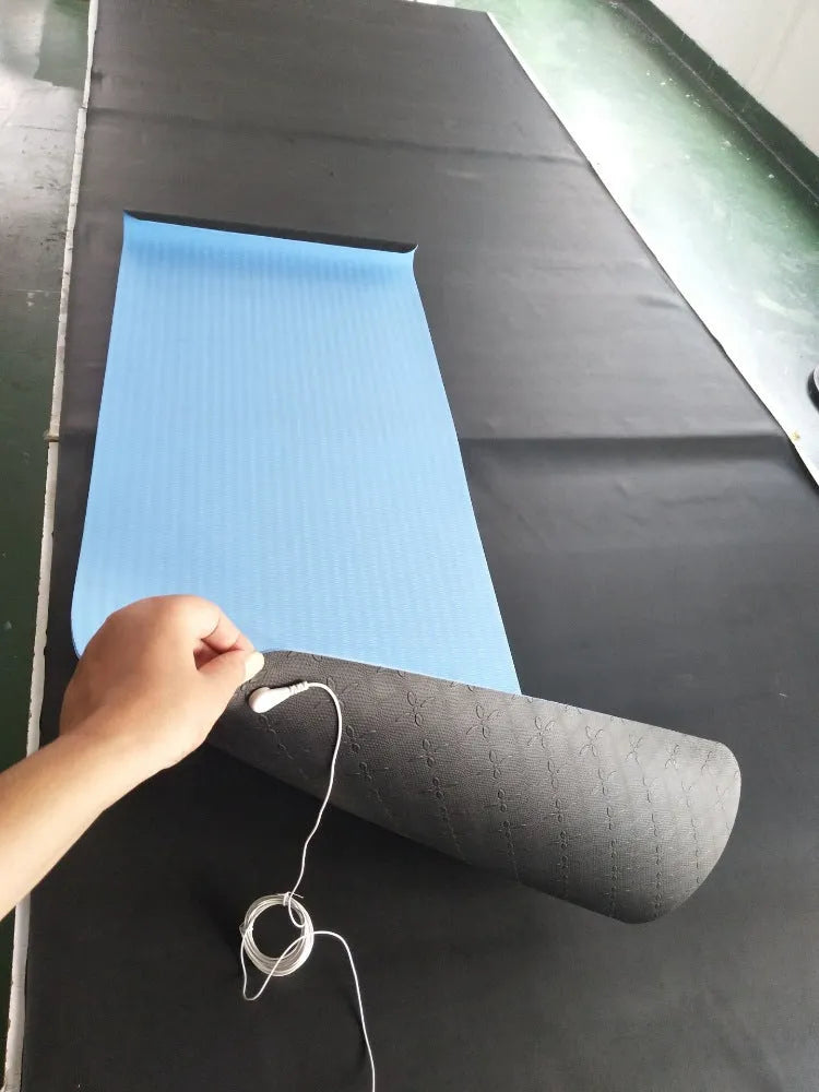 Blue conductive yoga mat with plant pattern measuring 182cm x 61cm