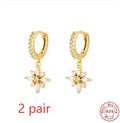 Sterling silver snowflake pendant earrings with diamond accents in gold colour options