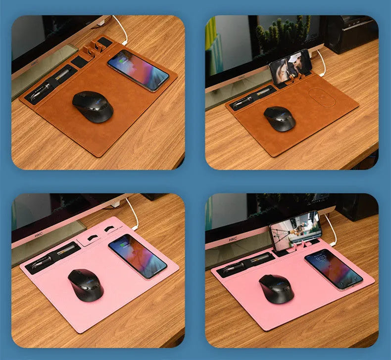 Pink wireless charging mouse pad with integrated phone holder on a wooden desk.