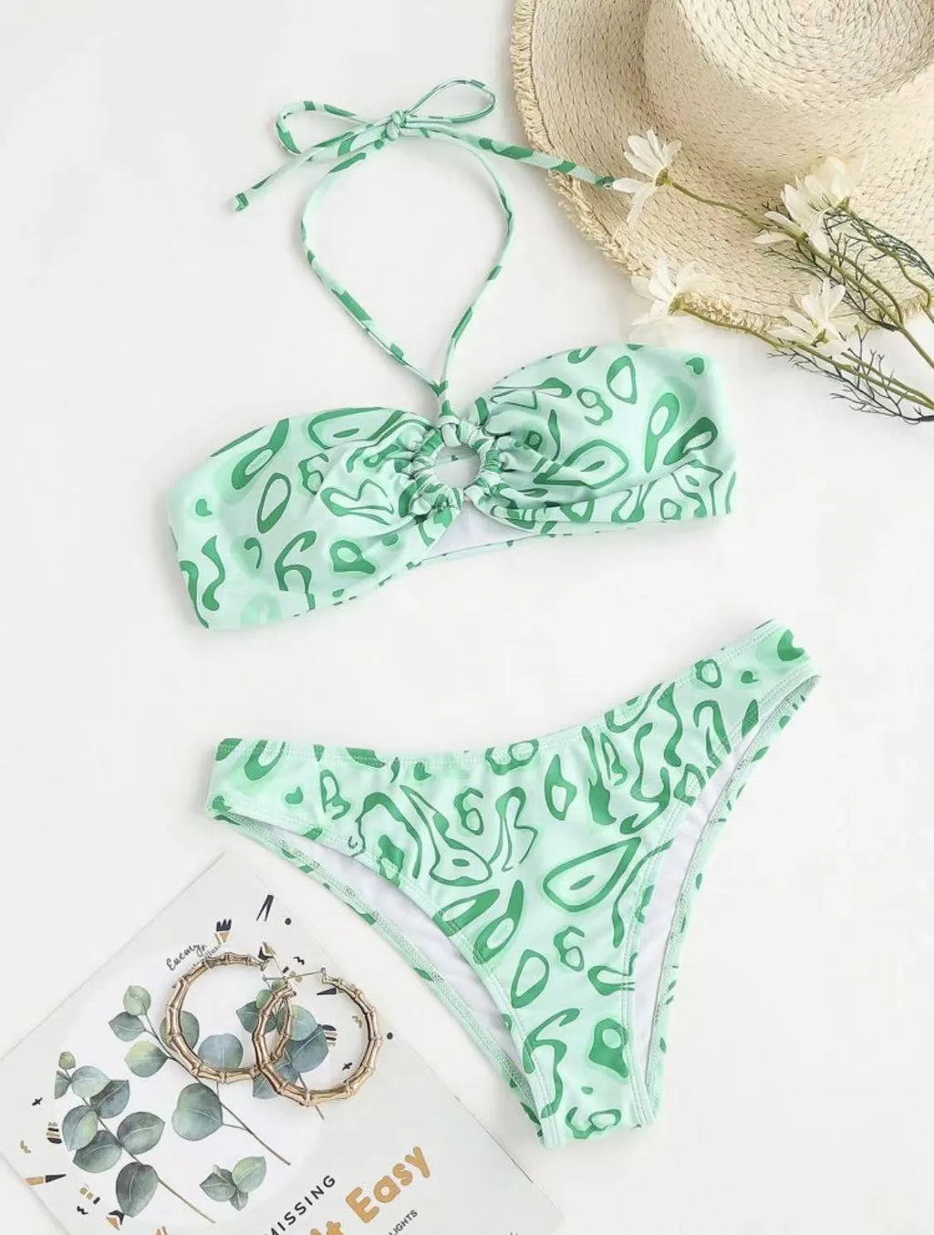 Women's floral bandeau bikini swimsuit in blue with split hipster design