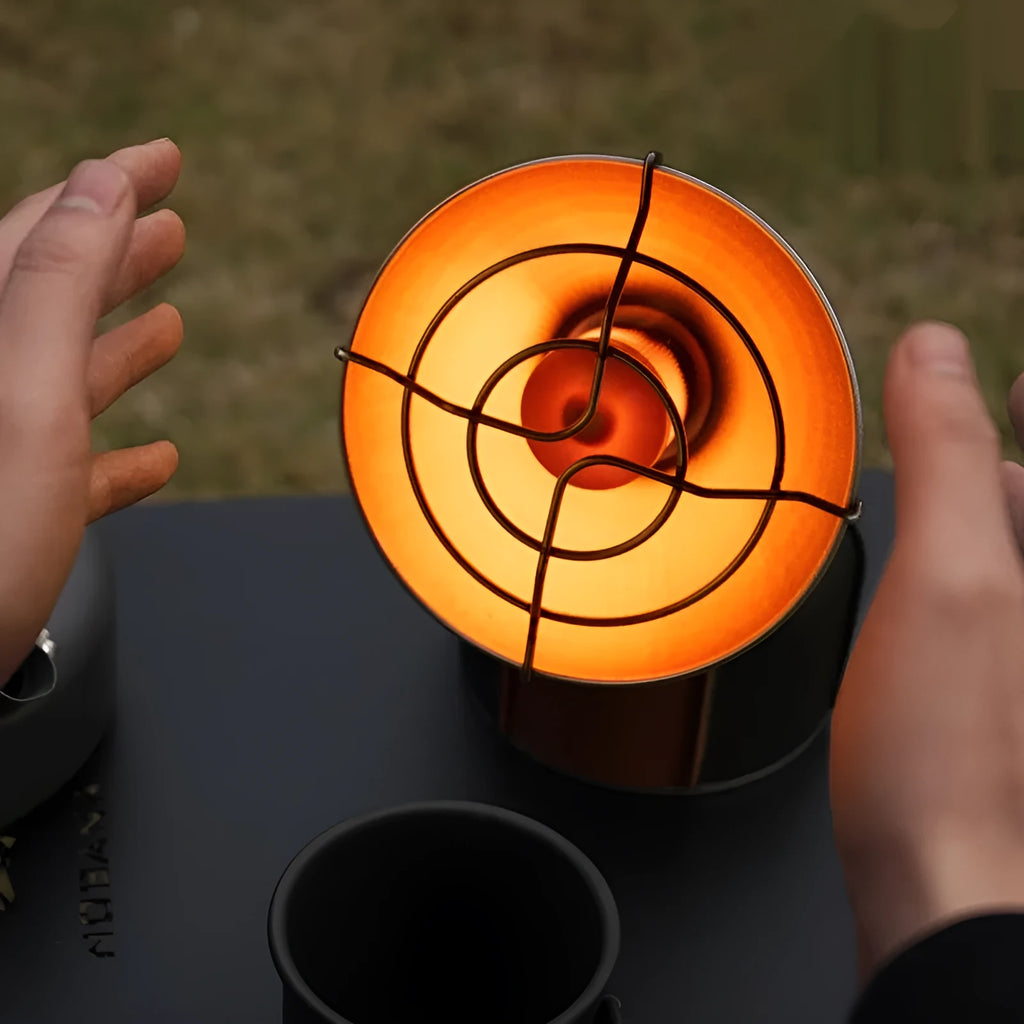 Portable black and orange camping heating stove with automatic ignition