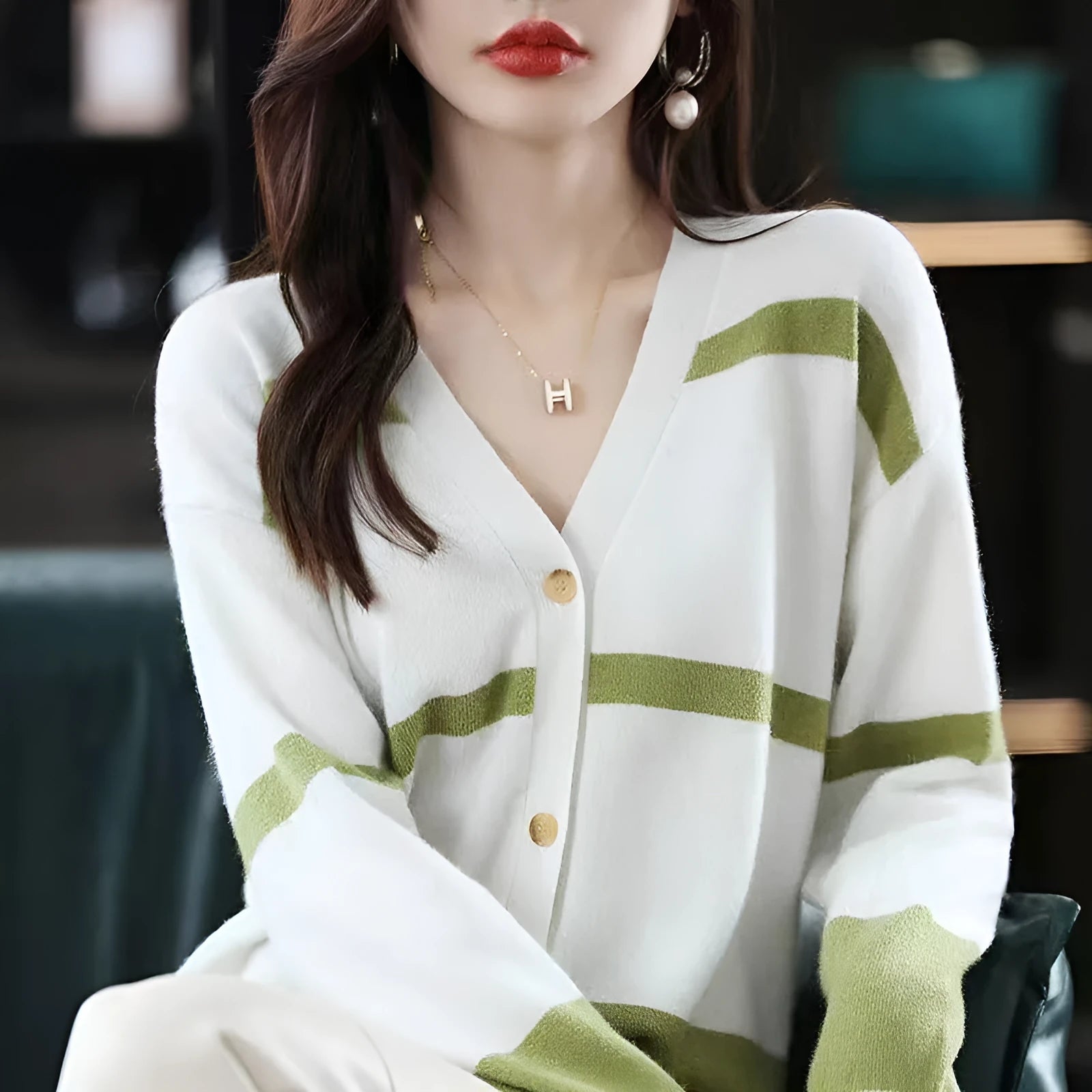 Women's black and white striped V-neck knitted cardigan with a 3D pattern and slim fit.