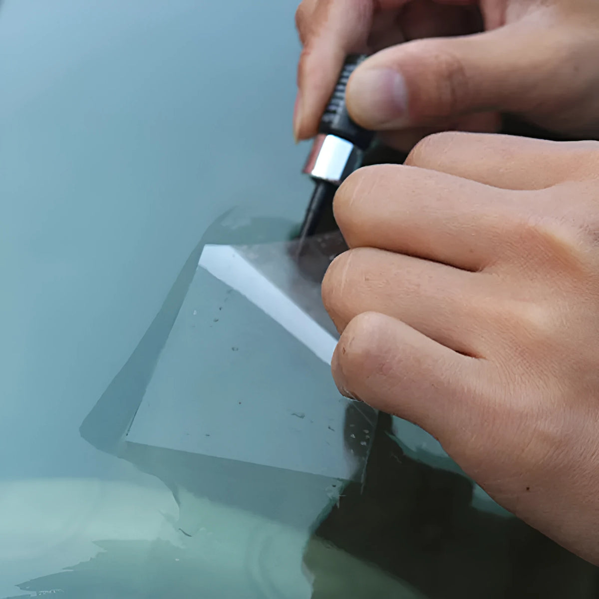 Yellow car glass repair tool set with windscreen repair liquid and injection tools