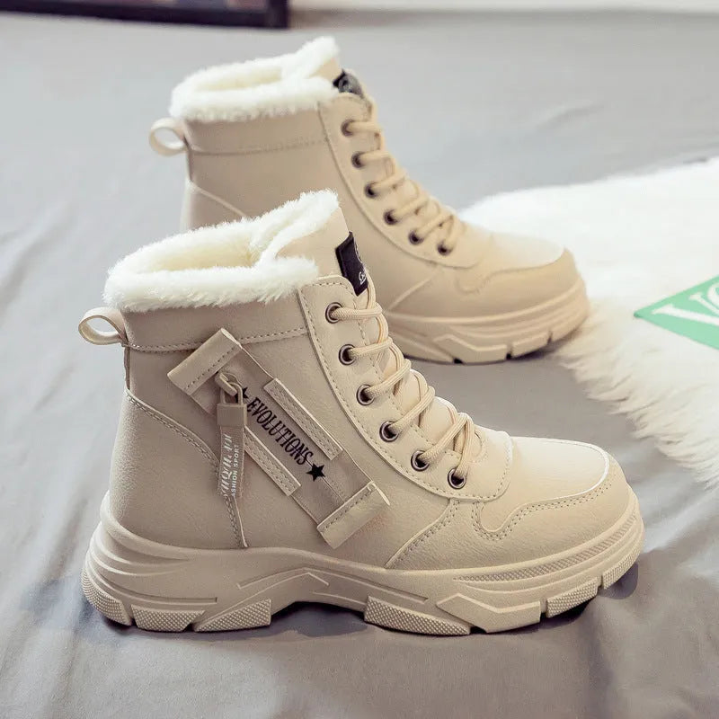 Women's plus size tall snow boot in black with front laces and a mid heel.