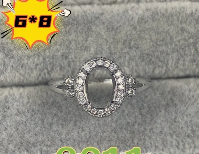 Oval denier ring with open mouth design, 6x8 main stone, and five-pointed star motif in electroplated copper