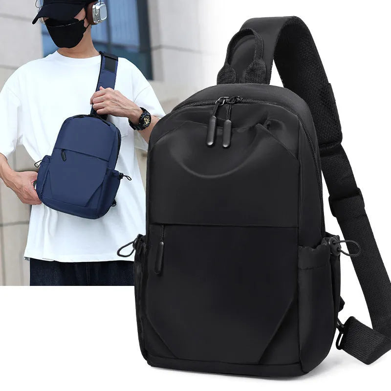 Men's grey waterproof chest bag showing front compartment with 33cm height measurement