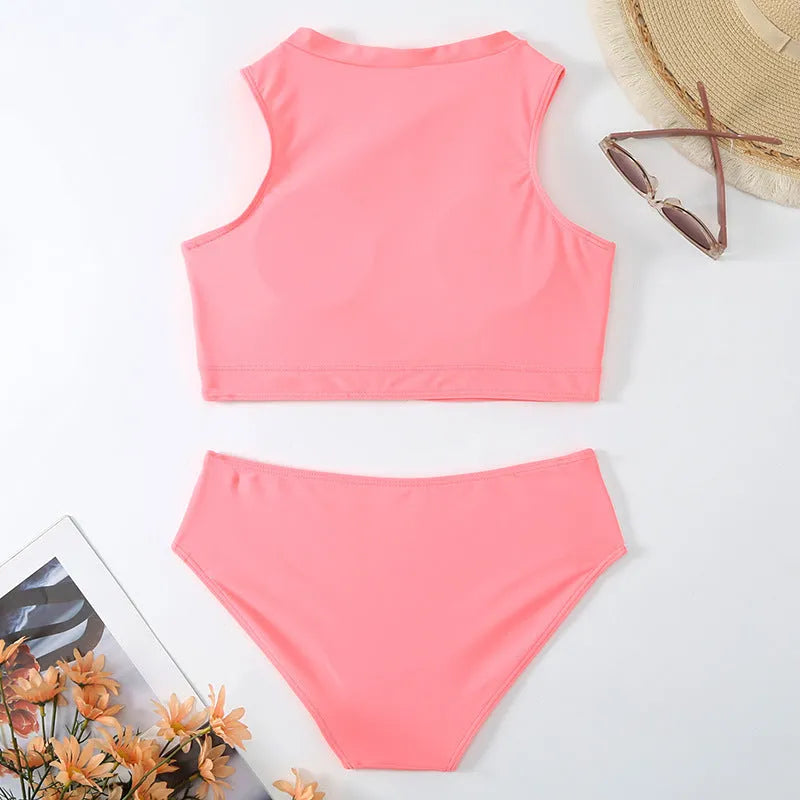 Pink high-waist split bikini swimsuit with sleeveless design and solid colour