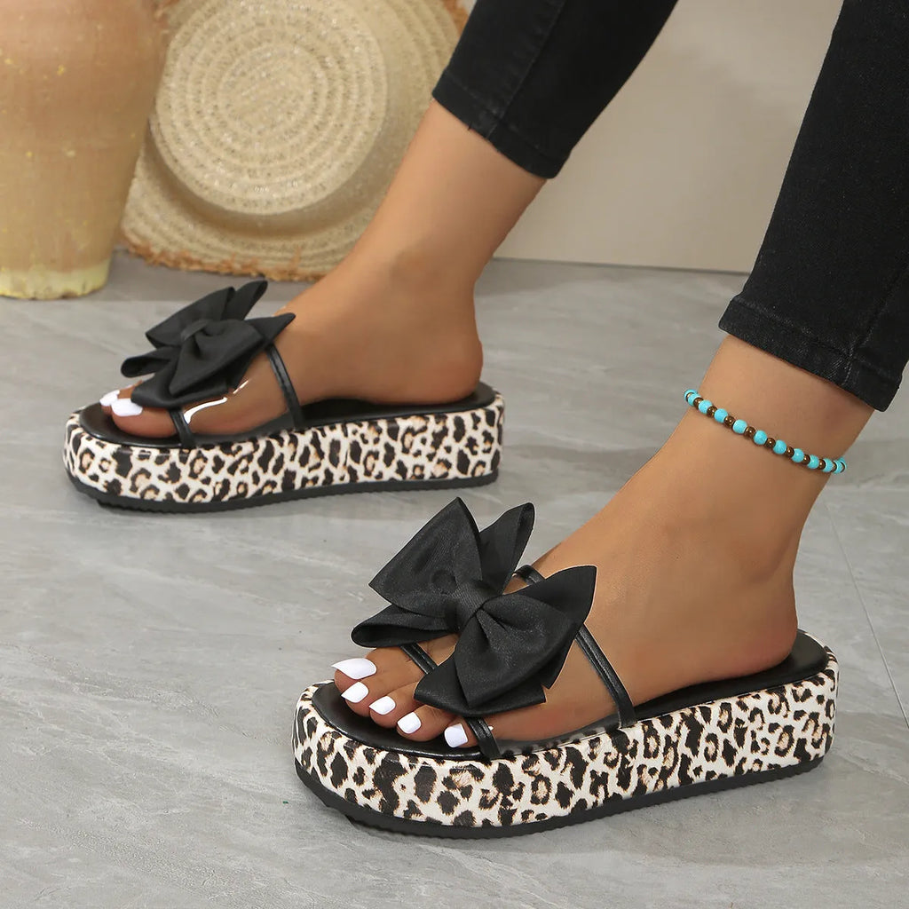 Leopard print women's beach slippers with thick sole and round toe in black or white