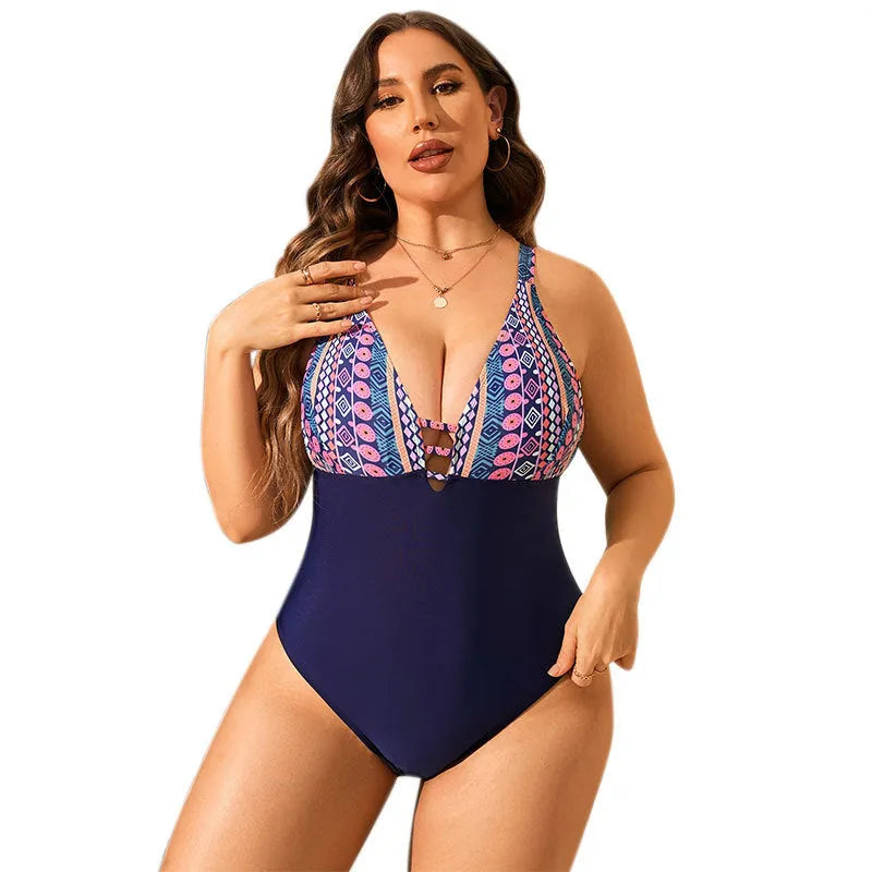 Plus size women's leopard print one-piece swimsuit with V-neck and tummy control design.