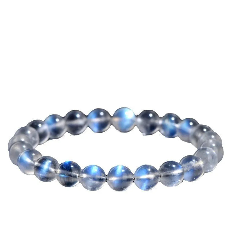 Natural Cream Body Blue Moonlight crystal bracelet with smooth ground beads.