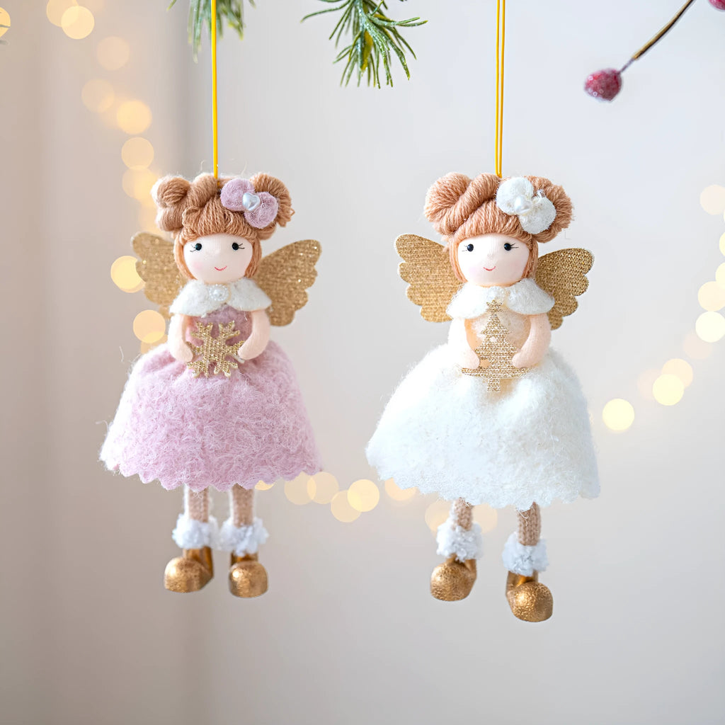 Pink and white cloth angel wings plush Christmas pendant ornament on a branch
