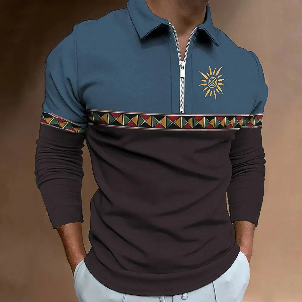 Man wearing a long-sleeved loose-fit striped top with retro colour printing and zipper details.