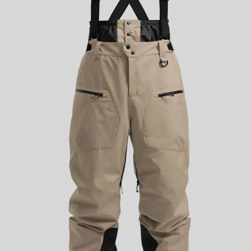Man wearing black thickened waterproof ski pants with visible adjustable waist straps.
