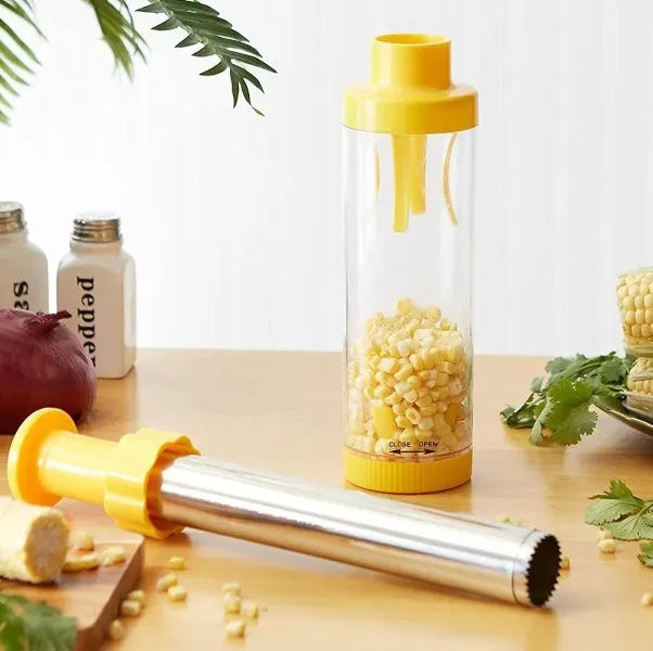 Yellow cylindrical corn stripper kitchen tool with ABS and stainless steel construction.