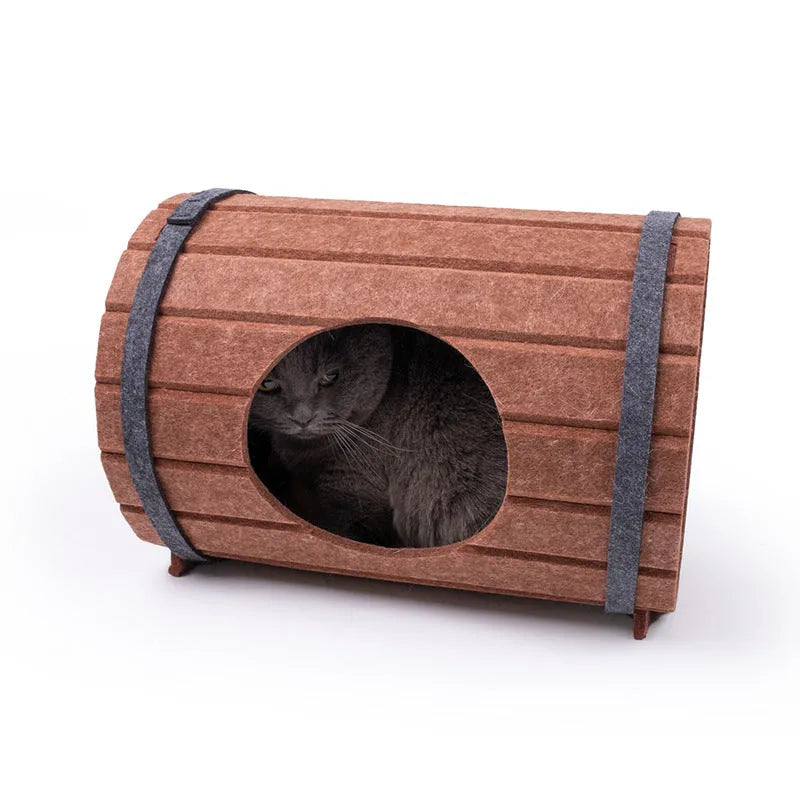 DIY assembled wine barrel shaped cat bed made from grey polyester felt panels.
