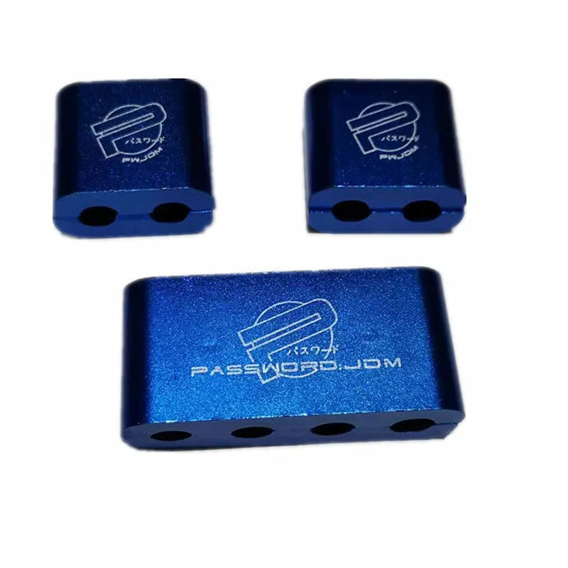 Three-piece metal car modification fastening clamp in assorted colours on a white background