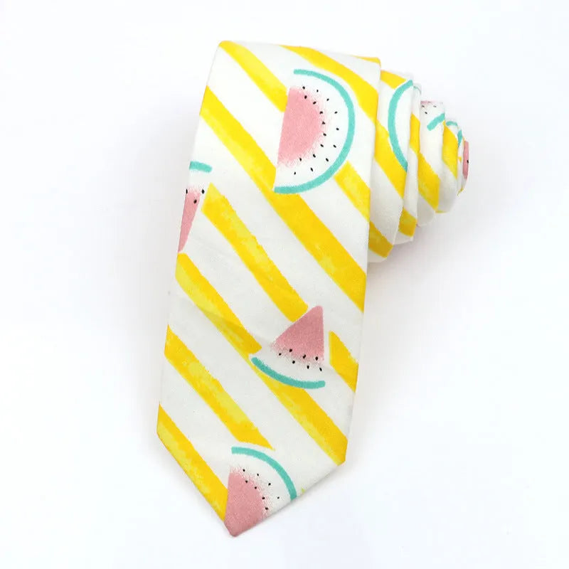 Narrow Korean-style cotton bow tie featuring a colourful cartoon print pattern.
