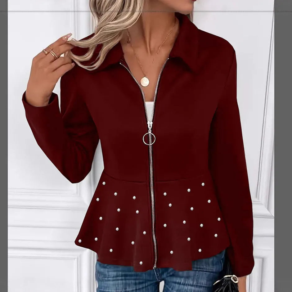 Women's black loose-fit coat with beaded heavy-duty zip and ruffle hem detail.