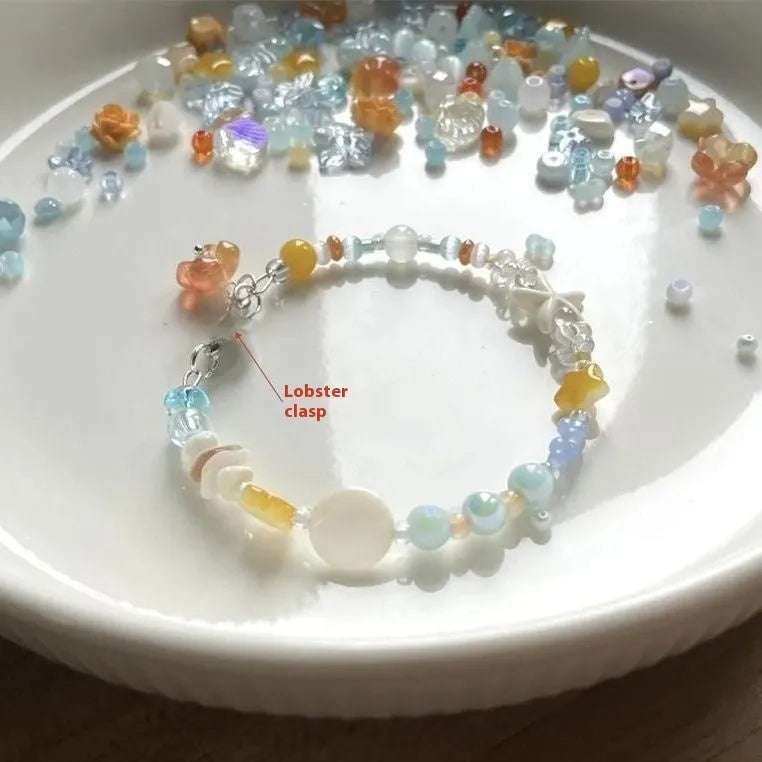 Orange seaside summer bracelet with round diamond elements and mixed alloy material construction