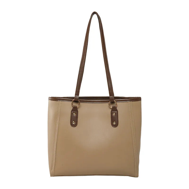 Large capacity PU tote bag in horizontal square shape with external slit pocket and internal organisation