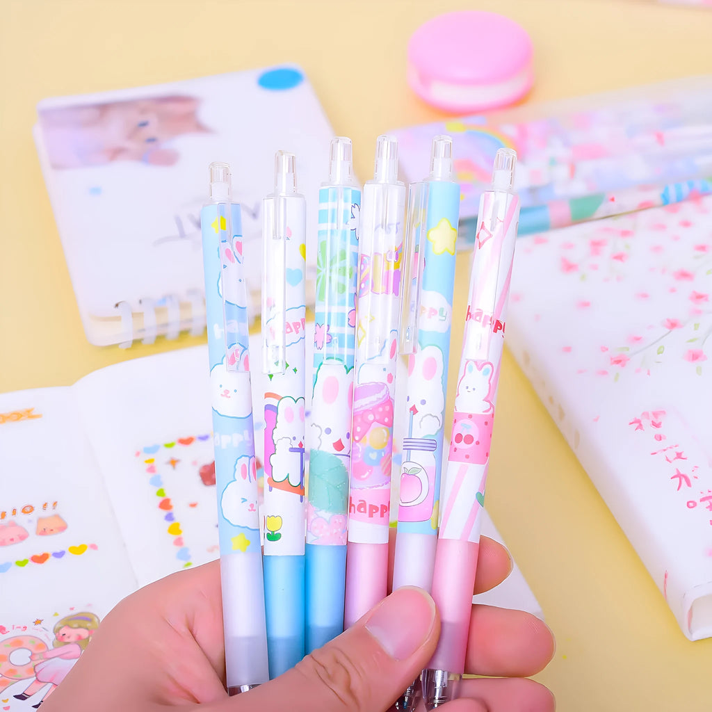 Six Cartoon Bunny brand black plastic pens with 0.5mm tips laid out from their box.