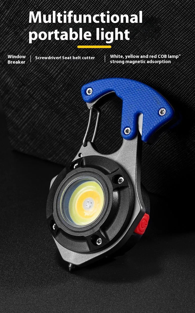 Compact silver and black multifunctional keychain flashlight with a window-breaking hammer tip and screwdriver.