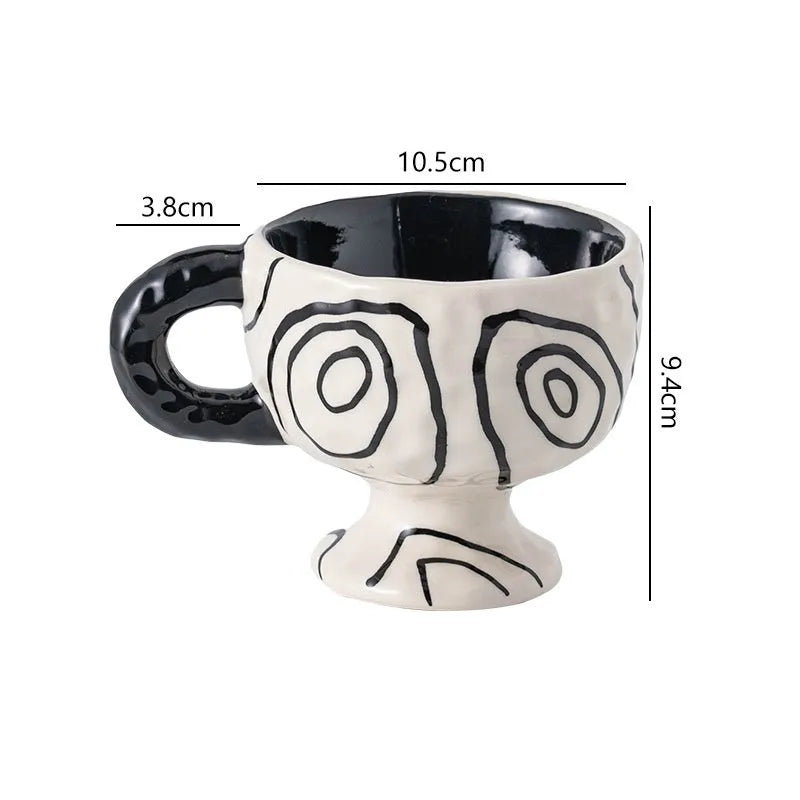 Hand-pinched irregular ceramic mug in a solid colour, shown from the side to display its unique shape.