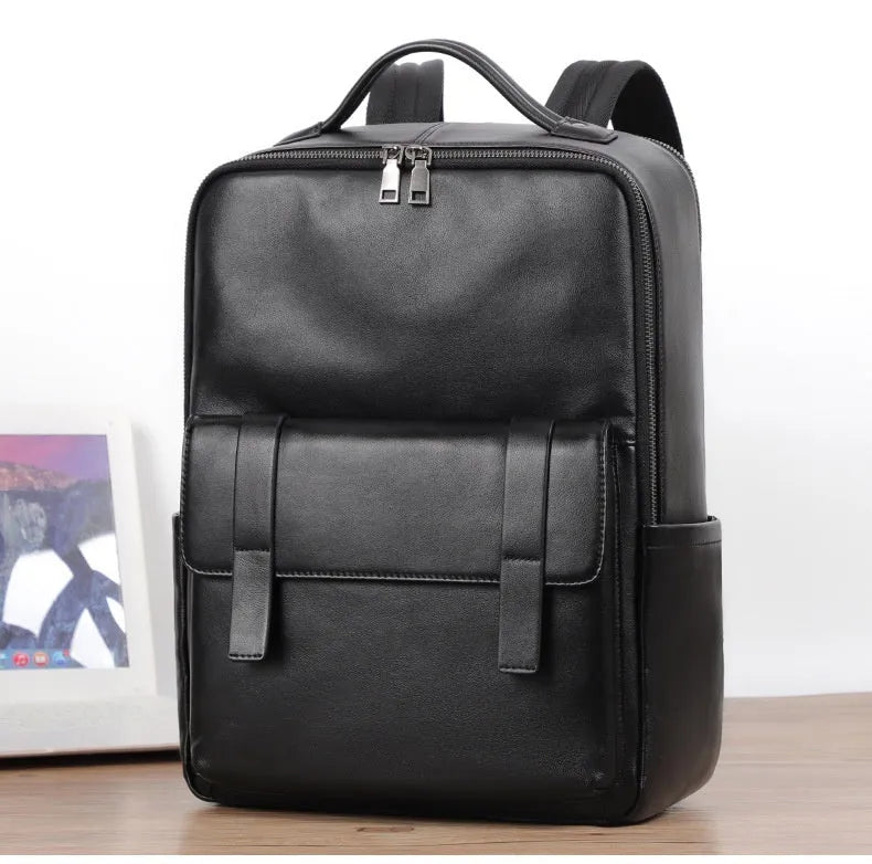 Men's black leather computer backpack with 36-55L capacity and physiological curve back plate