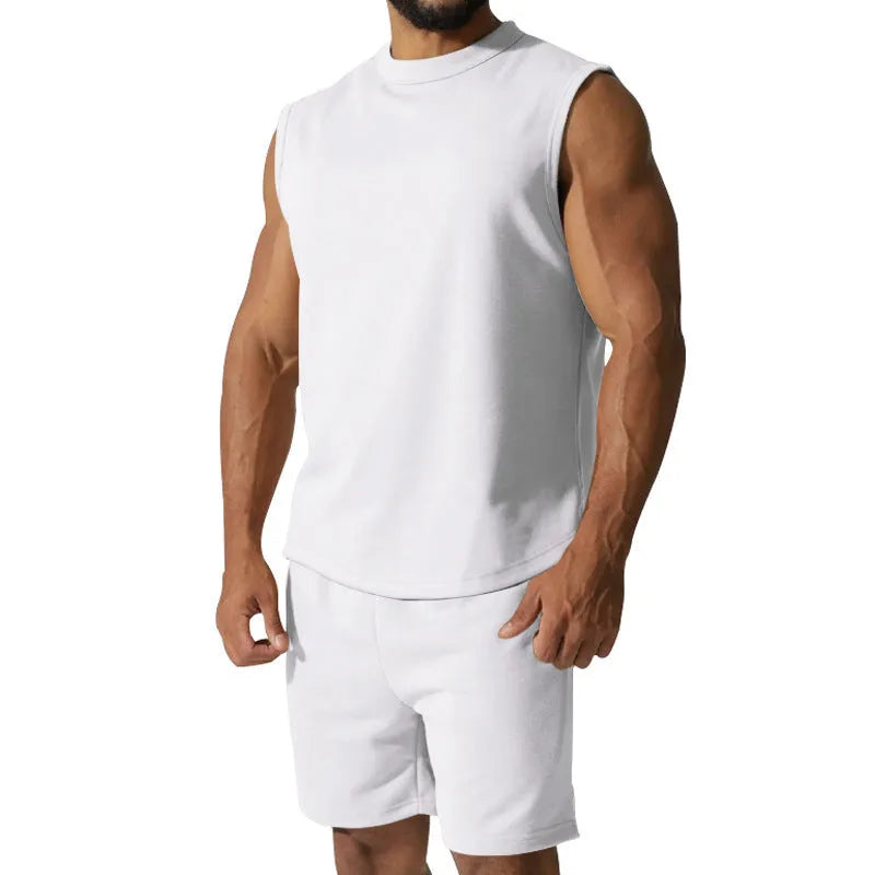 Men's sleeveless sports suit set in cotton blend fabric showing sleeveless top and matching shorts
