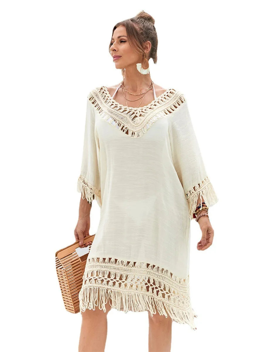 Apricot-coloured hand-crocheted beach dress for women, shown on a model.