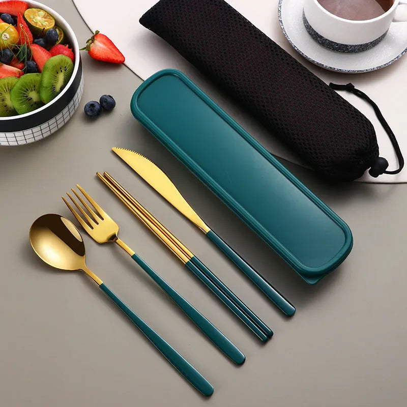 Four-piece stainless steel cutlery set with knife, fork, spoon and teaspoon in a mesh bag, gold and silver colour options