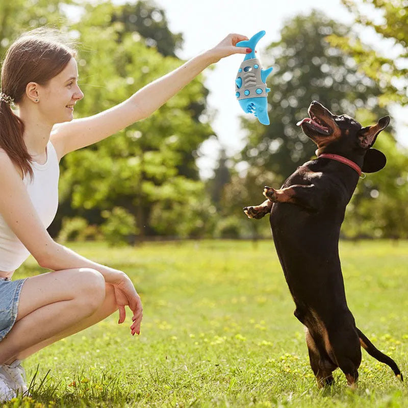 Blue, grey, and yellow dog teething toy with shark-tooth cleaning mimicry design