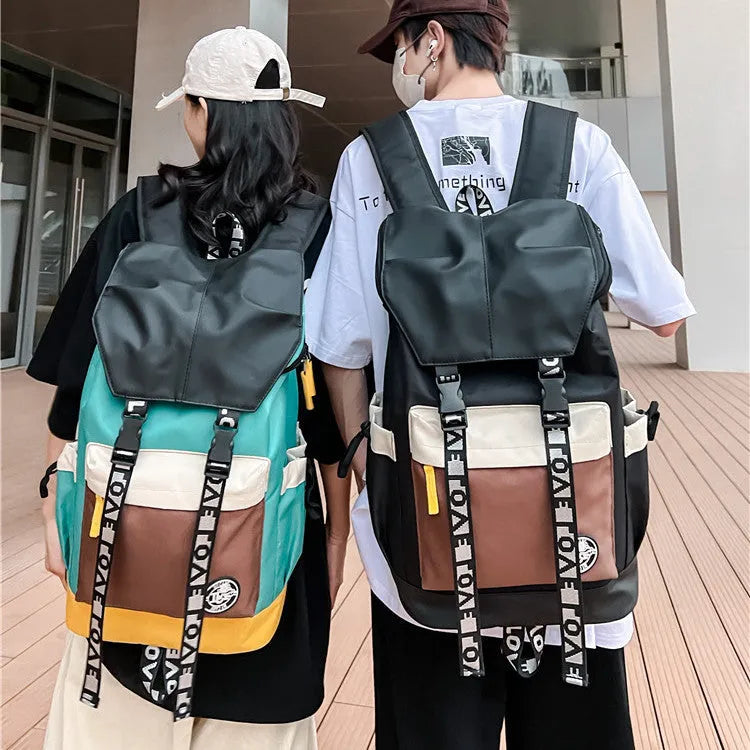 Oxford cloth backpack for junior high students in black, green or red with three carrying options.