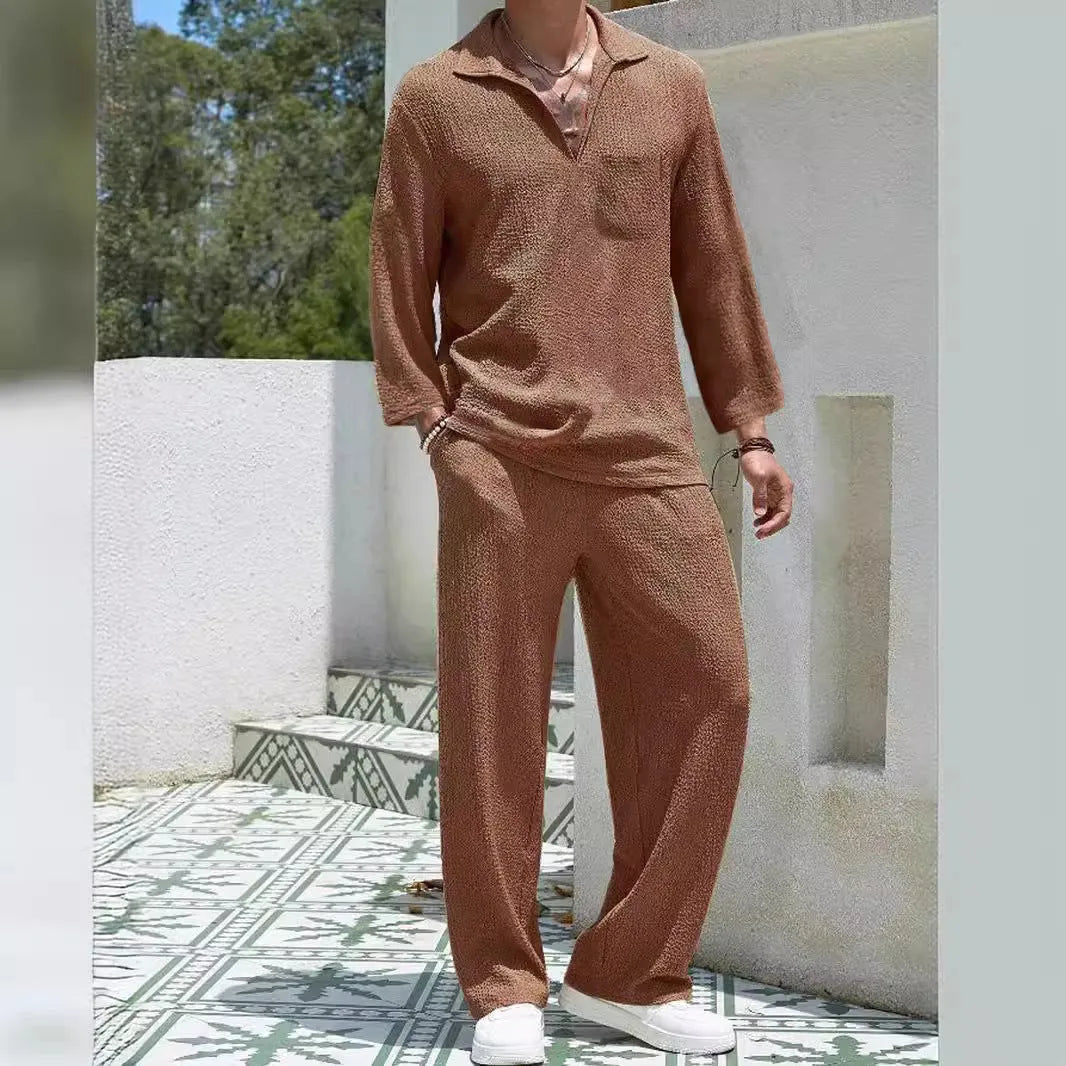 Men's casual shirt and trouser suit set in polyester fabric available in four colours.